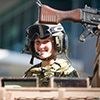Female soldier in a tank